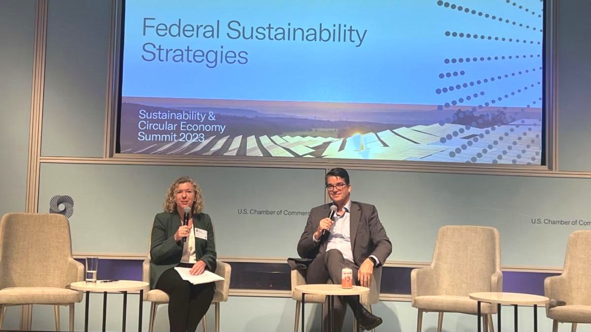 Photograph of Business Council for Sustainable Energy President Lisa Jacobson and Chief Federal Sustainability Officer Andrew Mayock onstage at the 2023 Federal Sustainability Summit.